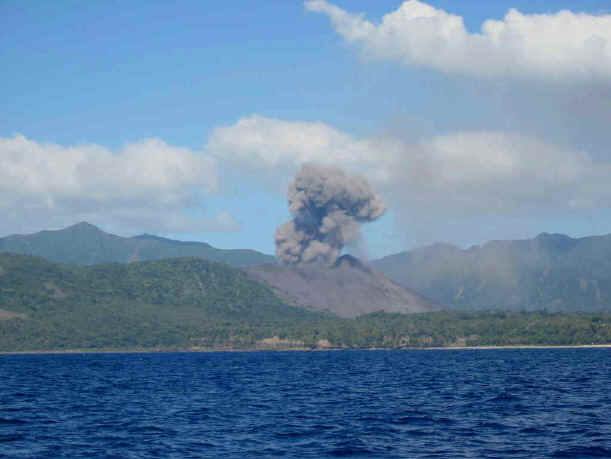 Eruption cloud above a Vanuatu volcano viewed from the water